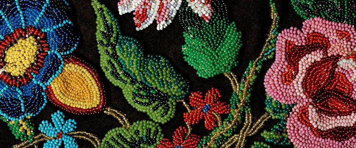 a close up photo of bead embroidery of a medicine bag