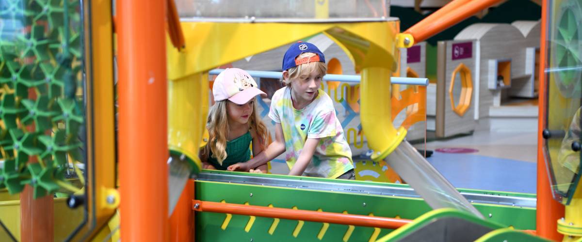 two children playing in the Children's Gallery