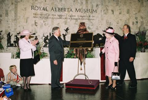 Queen Elizabeth unveils a plaque in the Royal Alberta Museum lobby