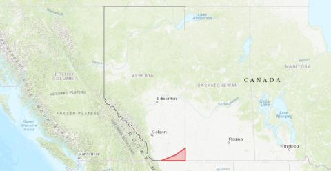 A map of Alberta with a small red triangle highlighted in the lower right corner.