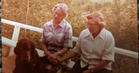 Jean Wallbridge and Mary Louise Imirie sit on the deck of their home in Edmonton