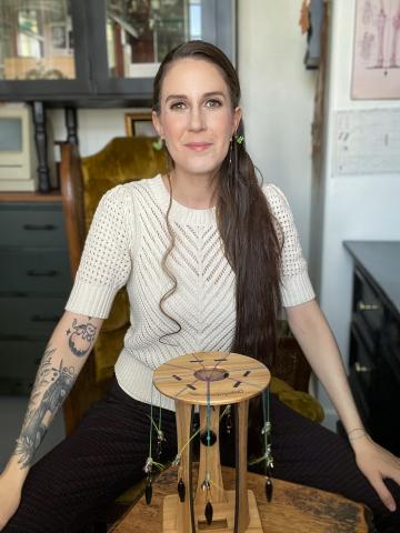 A photo of Zen in front of a tool.