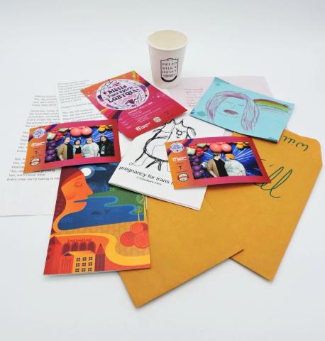 The full donation from Harper-Hugo Darling. There are photos of the couple, flyers from events, a zine, manila envelopes and various other paper ephemera. 