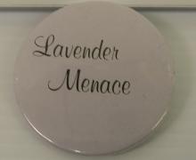 a white pin with the words "lavender menace"