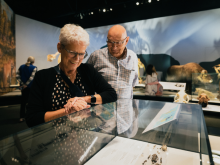 Two seniors look around the Natural History Hall