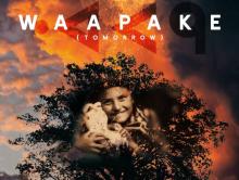 Waapake (tomorrow) film poster image. A smiling face in sepia tones overlays a silhouette of a tree. Pink clouds fill the background.